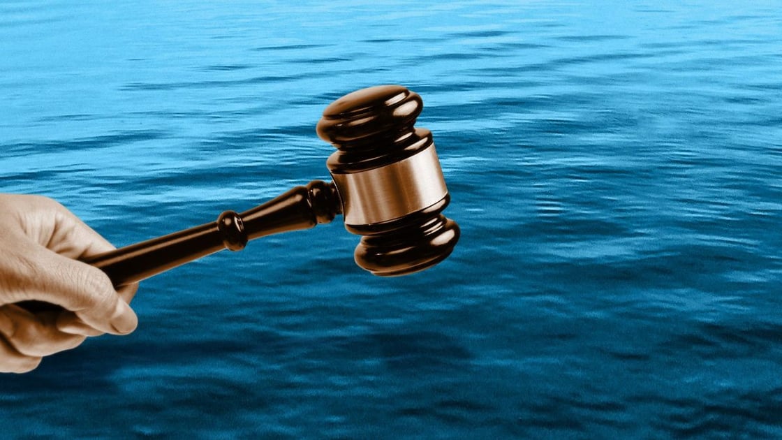 Gavel over water